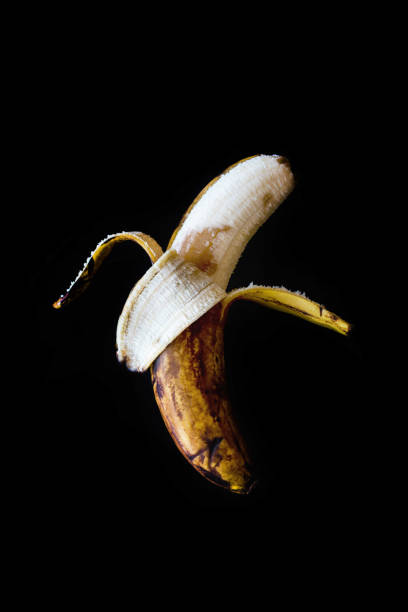istock banana on a black background 1187437635