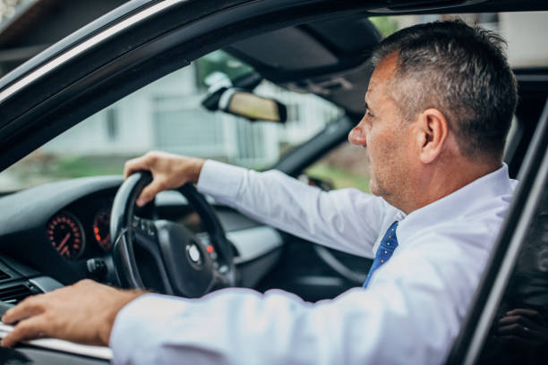 istock Senior man going to work by car 1187441035