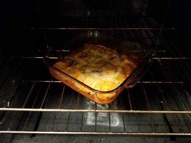 istock ravioli with cheese in glass container in oven 1187444517