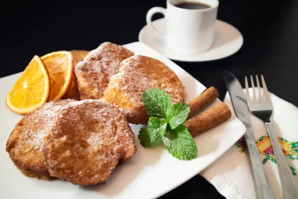 Photo of Spanish breakfast food Torrijas with coffee