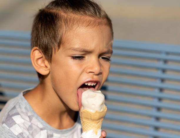 istock The boy eating a delicious ice cream 1187454951