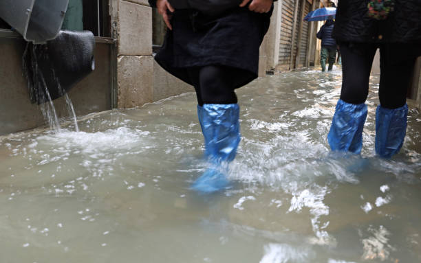 istock Venice Italy during the tide and a bucket to empty the interior 1187456815