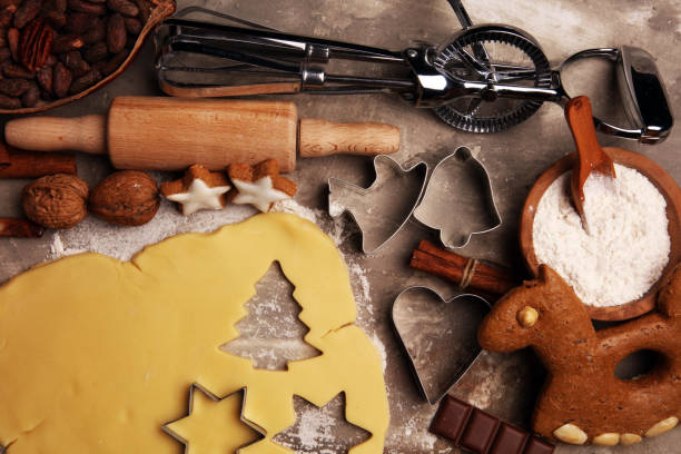 istock Baking christmas cookies. Typical cinnamon stars bakery with spices. xmas decoration on table 1187462512