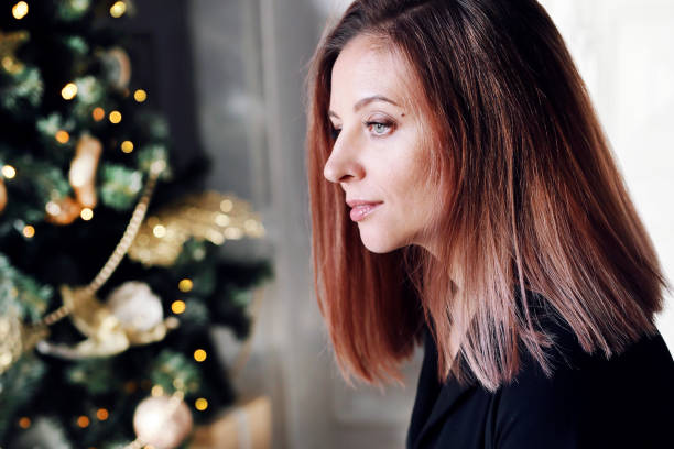 istock Beautiful woman and Christmas 1187464238