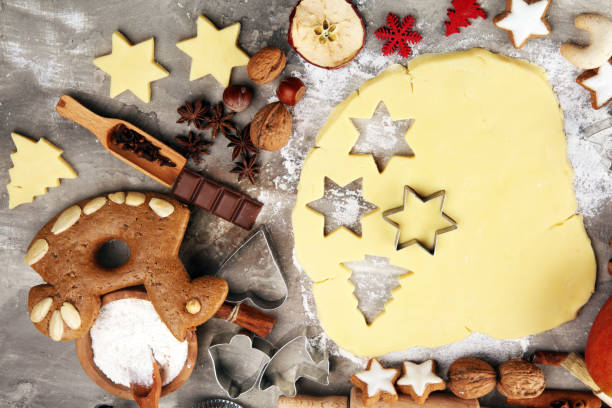 istock Baking christmas cookies. Typical cinnamon stars bakery with spices. xmas decoration on table 1187465499
