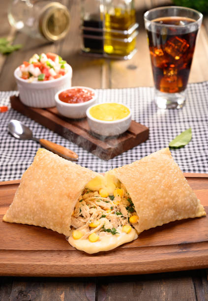 Chicken pastry with catupiry (chicken pastel with catupiry) - Traditional Brazilian stock photo