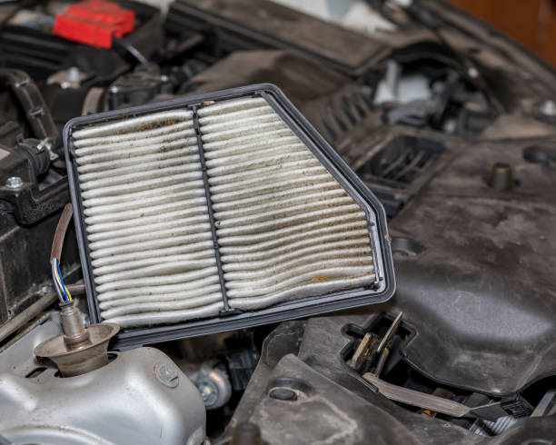 dirty air filter for car engine. concept of automobile maintenance and service - air filter car motor vehicle engine imagens e fotografias de stock