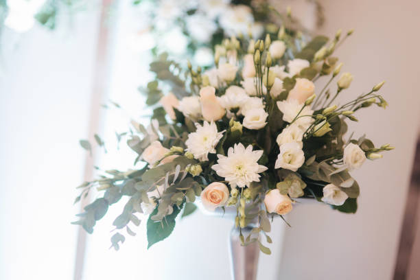 istock Flowers on the wedding table in restaurant 1187471711