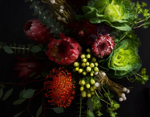 istock Still life with flowers on dark background 1187474024