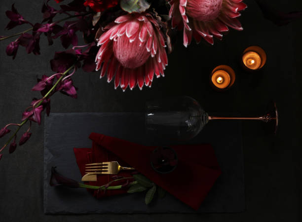 still life with flowers on dark background - napkin black blank ideas imagens e fotografias de stock