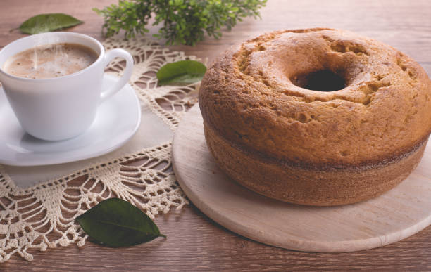 Traditional cake and a cup of milk with coffee | Grandmother cake stock photo