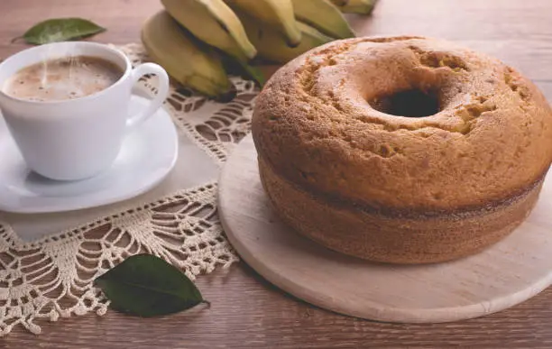 Traditional banana cake and a cup of milk with coffee  | Grandmother cake
