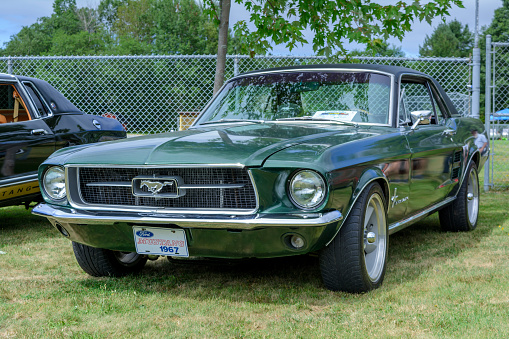 Kingston, Nova Scotia, Canada - August 24, 2019 : 1967 Ford Mustang coupe at Autos for Autism Show & Shine in Annapolis Valley region of Nova Scotia.