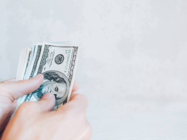 istock profitable business american hundred bucks hands 1187482400