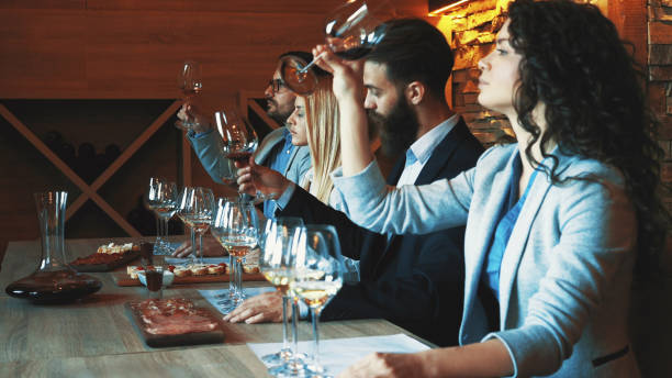 istock Friends tasting wine together 1187483263