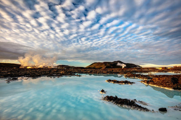 Blue Lagoon, Iceland Amazing clouds and reflection at the Blue Lagoon in Iceland iceland stock pictures, royalty-free photos & images