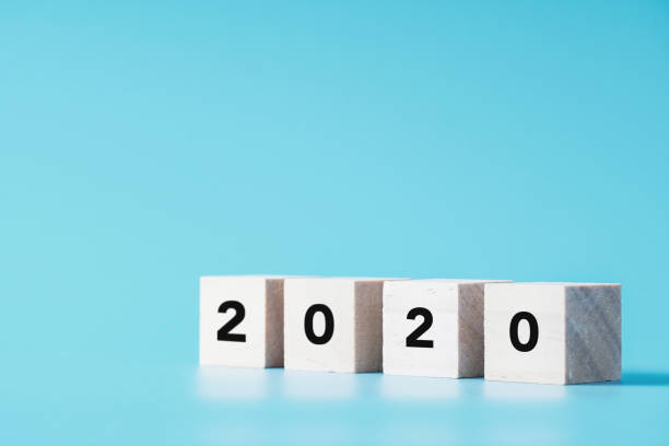 istock New Year concept with 2020 text on wood cube shape, copy space 1187485413