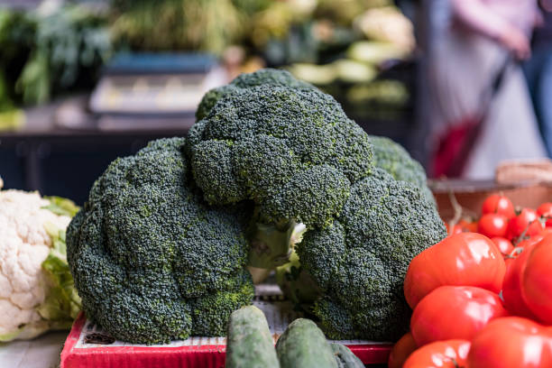 Close-up View at the Fresh and Delicious Organic Broccoli at the Farmers Market.