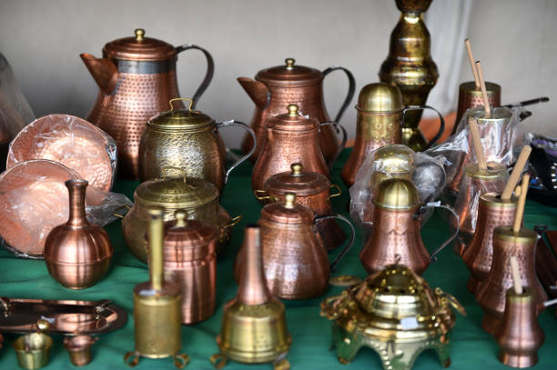istock bronze vases in a medieval market 1187493884