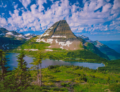 Springtime at Logan Pass with rugged mountain peak