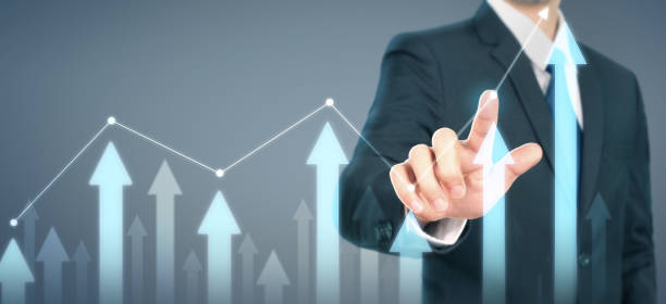 istock Businessman plan graph growth increase of chart positive indicators in his business 1187501736