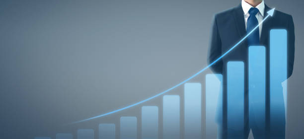 istock Businessman plan graph growth increase of chart positive indicators in his business 1187501740