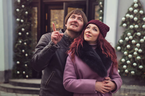 istock Lovers walk at the christmas market 1187509842