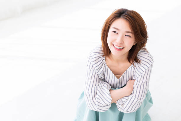 istock asian woman relaxing 1187518512