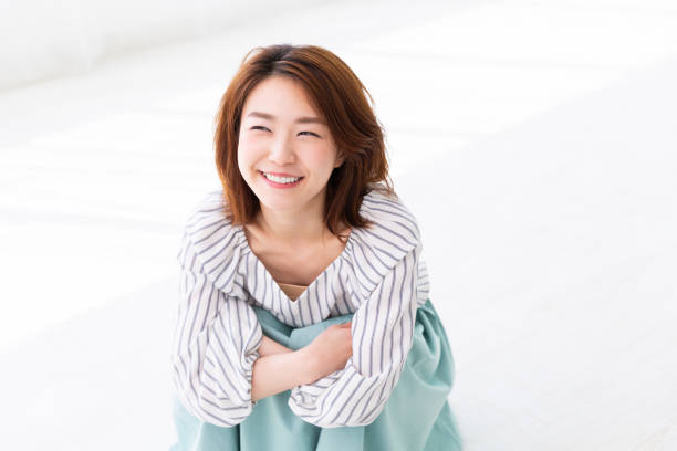 istock asian woman relaxing 1187519898
