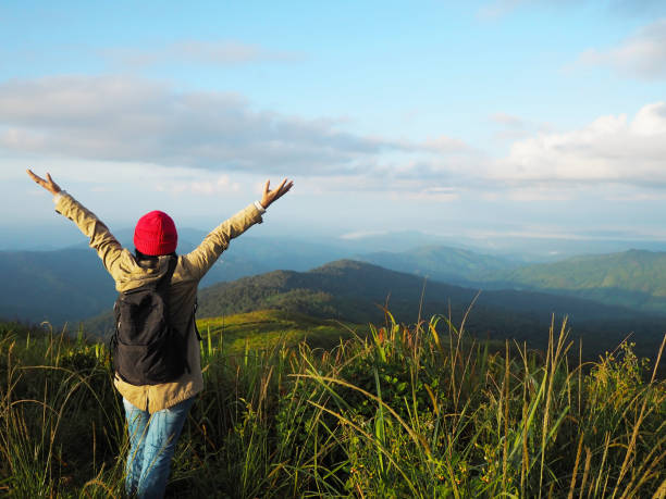 istock woman on the mountain 1187522375
