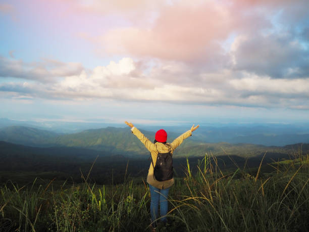 istock woman on the mountain 1187522673