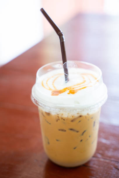 istock caramel macchiato in plasstic glass 1187522807
