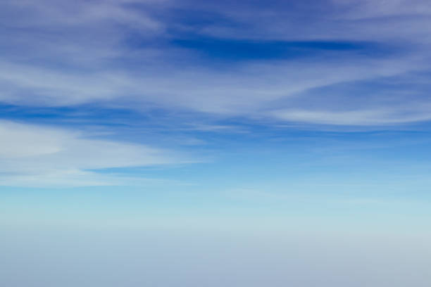 istock Aerial view sunset sky above clouds with dramatic light. View from airplane 1187525853