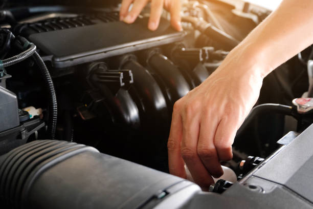 istock Car maintenance technician He is checking the auto engine, car inspection center. 1187527081