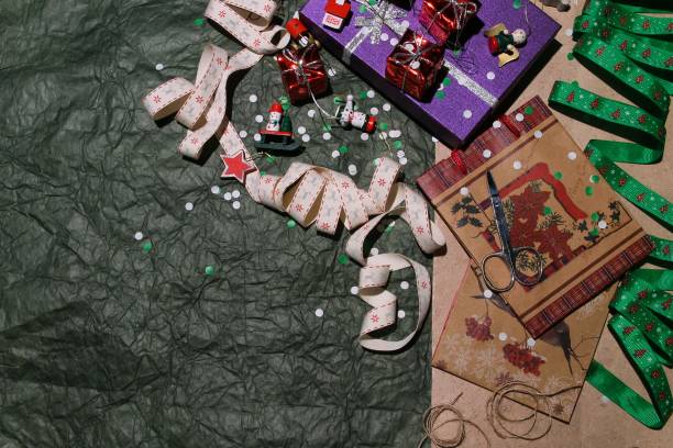 istock Making and wrapping Christmas presents. Ribbon and Gift Boxes 1187530603