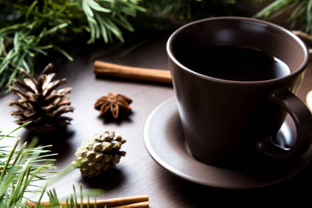 istock Christmas new year concept with coffee Cup, Christmas tree and cones. Layout with a Cup of coffee for new year and Christmas. 1187548550
