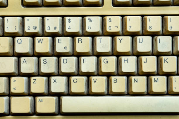 istock Old keyboard of a computer close up 1187550418