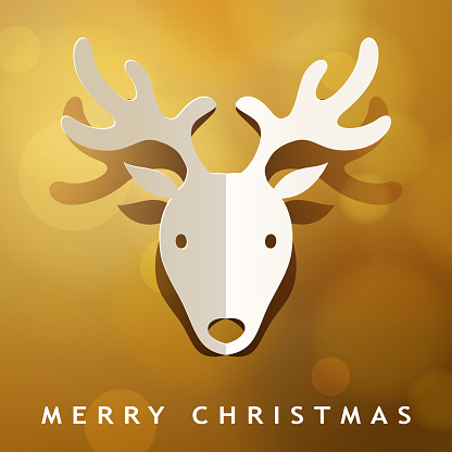 Celebrate Christmas with paper craft of folded Christmas reindeer on the gold colored background