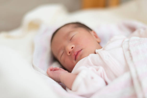 istock Baby sleeping in newborn room 1187551744