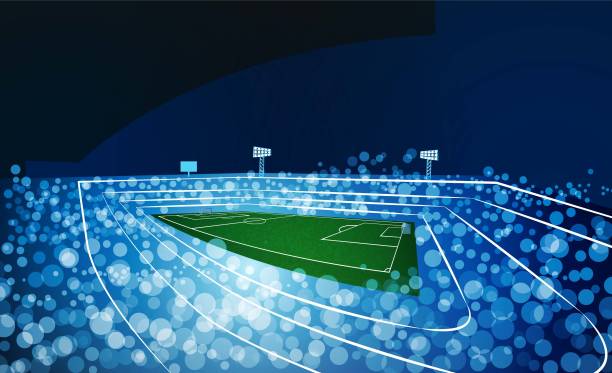istock Football arena field with bright stadium lights 1187553029