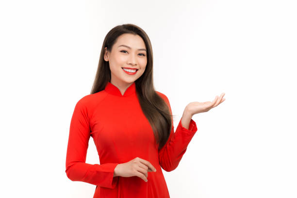 Vietnamese woman with open hand palm on background