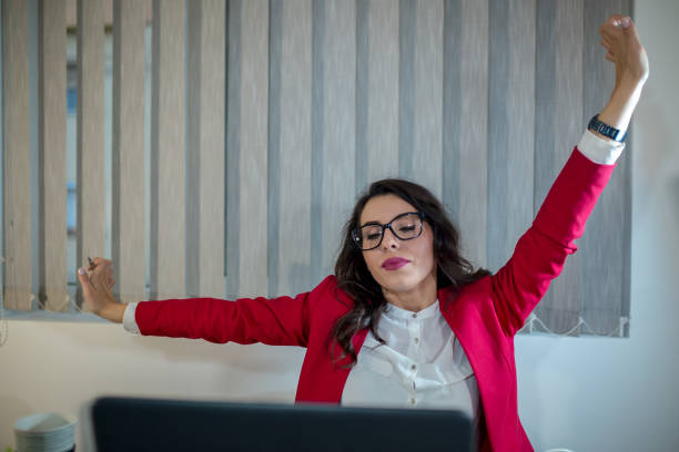 istock Beautiful girl in the office 1187558563