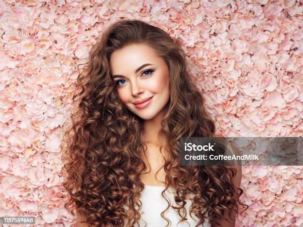 Beautiful Girl With Long And Curly Hairs Stock Photo - Download Image Now - Wedding, Portrait, Ceremonial Make-Up
