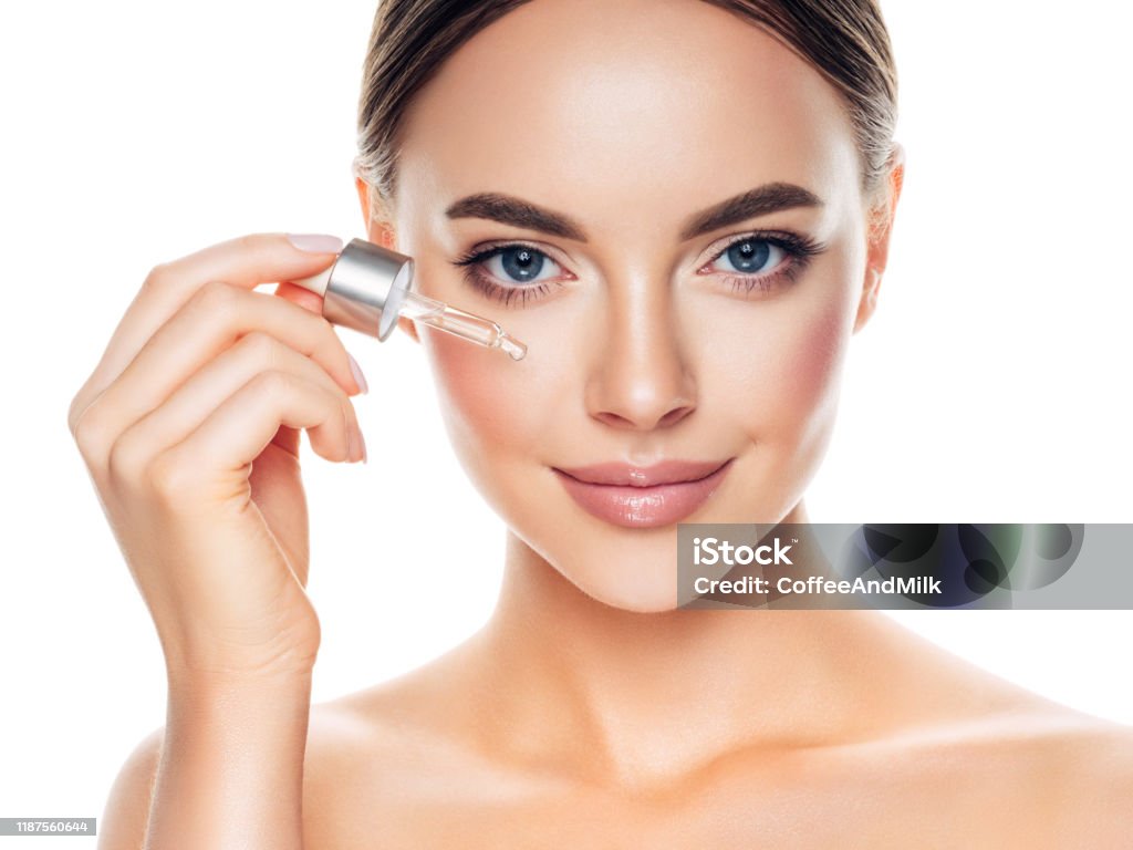 Beautiful girl getting skin anti aging treatment Human Face Stock Photo
