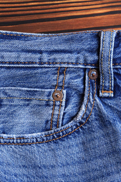 istock Denim jeans texture or denim jeans background with old torn. 1187560668