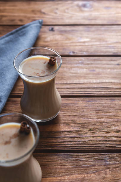 istock Masala tea with cinnamon in transparent glasses on a wooden table 1187560862