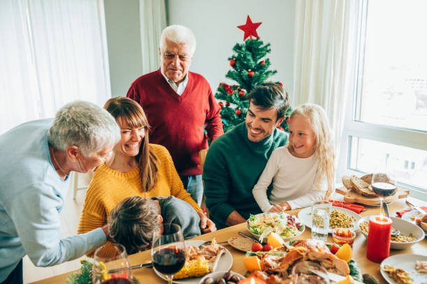istock Three generation family on Christmas. 1187562888