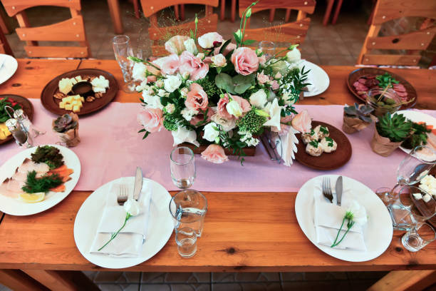 istock Banquet table in rural style with flowers 1187563083