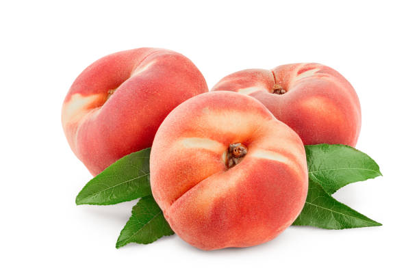 istock Ripe chinese flat peach fruit with leaf isolated on white background 1187566192