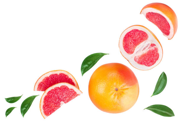 istock Grapefruit and slices with leaves isolated on white background with copy space for your text. Top view. Flat lay pattern 1187566218
